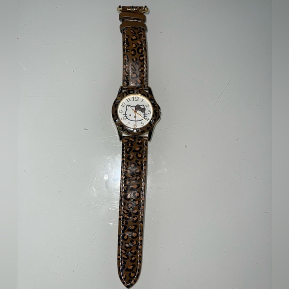 sanrio-accessories-hello-kitty-cheetah-print-watch-poshmark